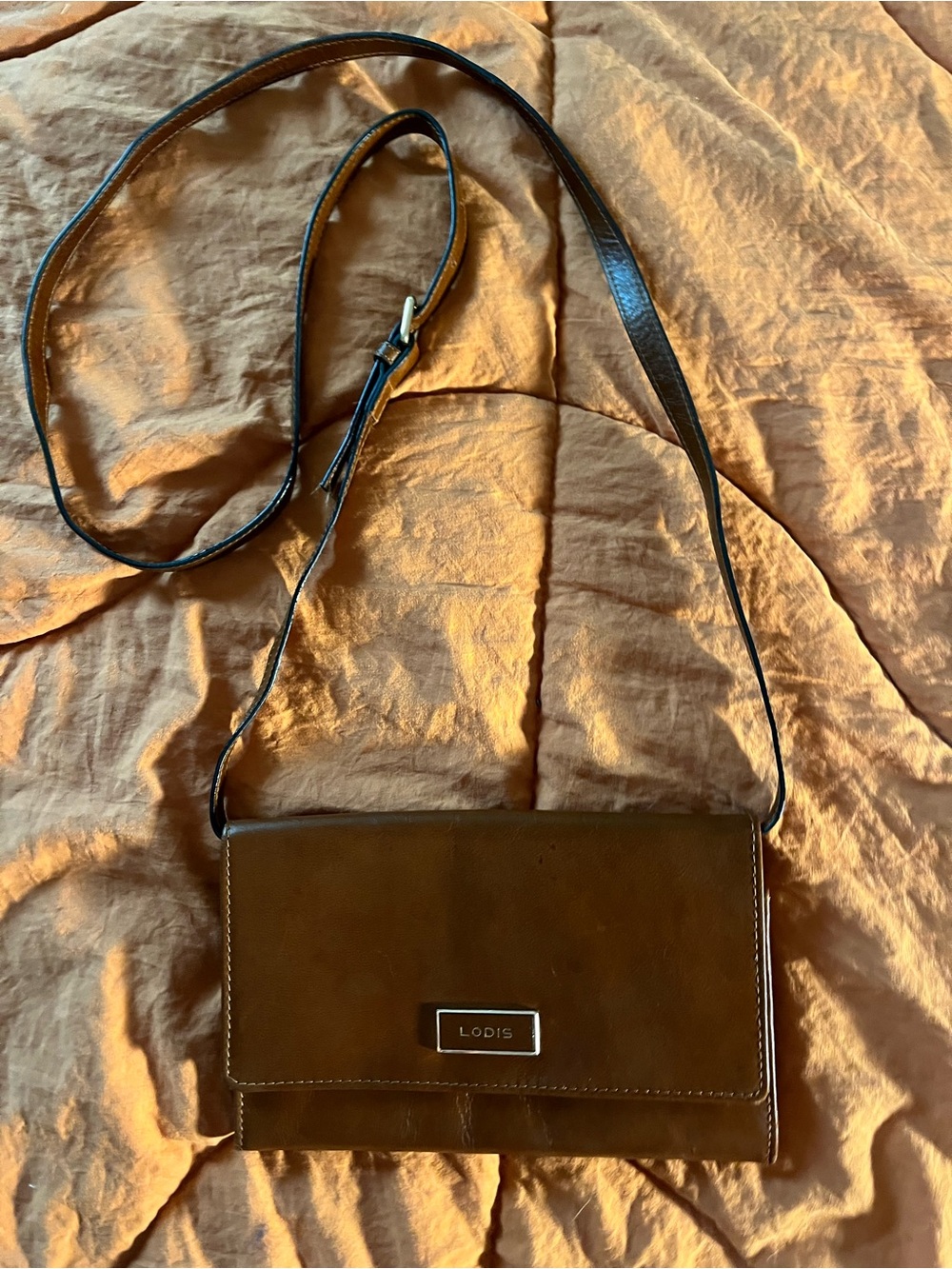 Vintage LODIS brown leather shoulder bag with a classic envelope silhouette